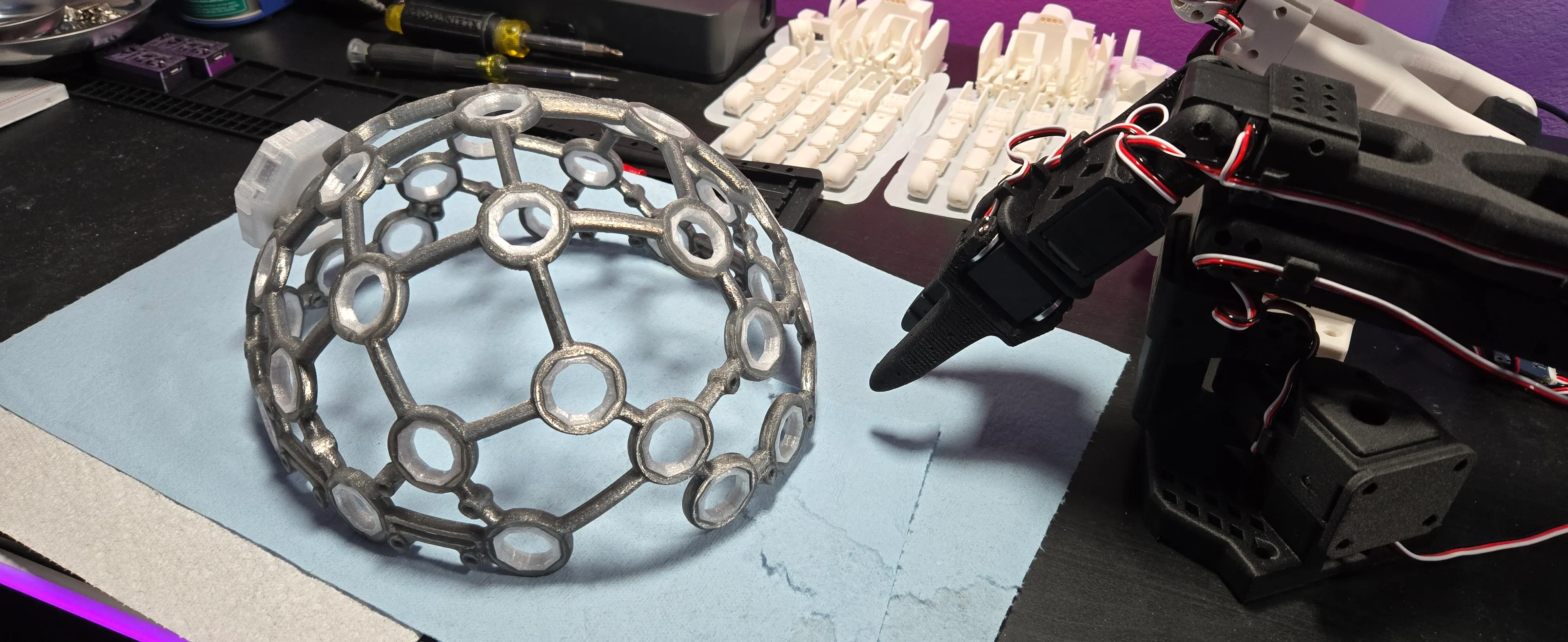 OpenBCI Ultracortex Mk IV frame, printed and assembled in clear-black polycarbonate.
